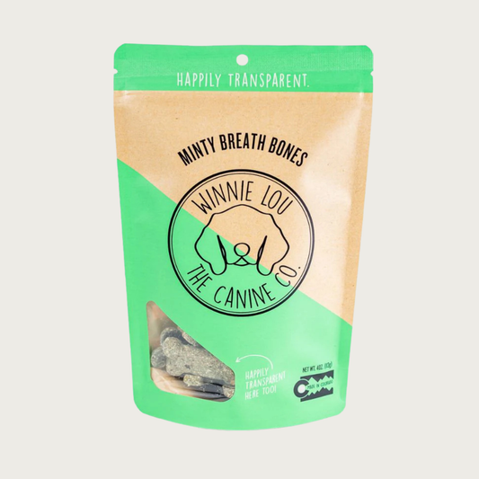 Light green & beige bag of Minty Breath Bones dog treats with simple illustrated line logo for Winnie Lou the Canine Co. in the center. Happily Transparent. Made in Colorado.