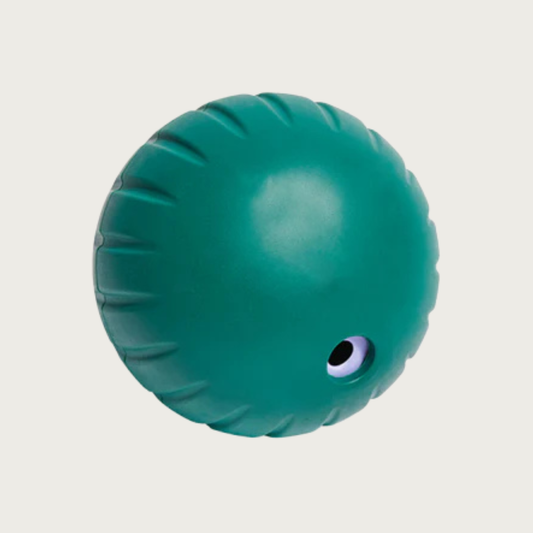 Dark green ball with small hole opening at the bottom. Sides have ridges.