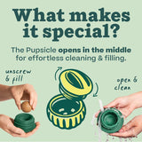 Large text at top of image reads: "What makes it special? The Pupsicle opens in the middle for effortless cleaning & filling." Below center is an illustrated Pupsicle toy, opened up. To its left is a pair of hands, one holding the base of the toy and the other dropping in a Pupsicle Pop treat, with text "unscrew & fill". To its right is another pair of hands, washing the opened toy under water, with text "open & clean". 