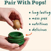 Simple image of a pair of hands, one holding the bottom of the Pupsicle and the other dropping a Pupsicle Pop inside. Text reads "Pair with Pops! Long lasting, mess free, nutritious, delicious."