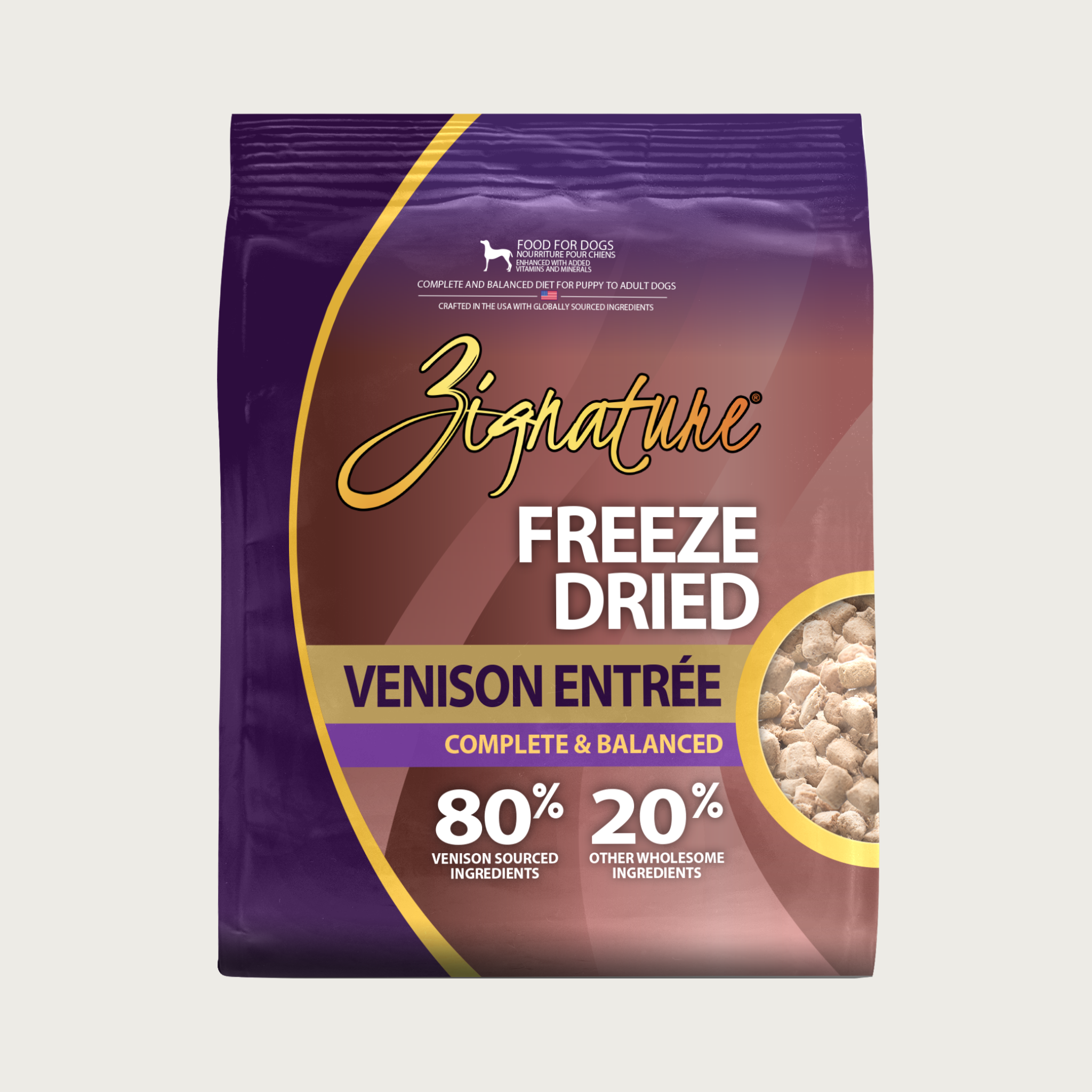 Brown & purple bag of Zignature Freeze Dried Venison Entrée Complete & Balanced dog food. 80% venison sourced ingredients, 20% other wholesome ingredients.