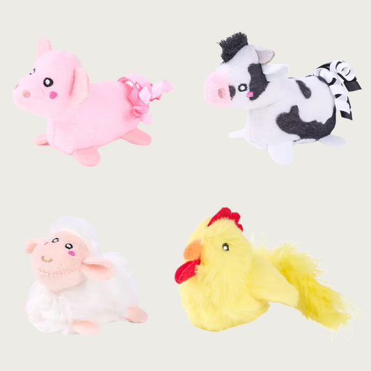 Four plush farm-inspired cat toys. Pink pig, black & white cow, white sheep, yellow chicken. 