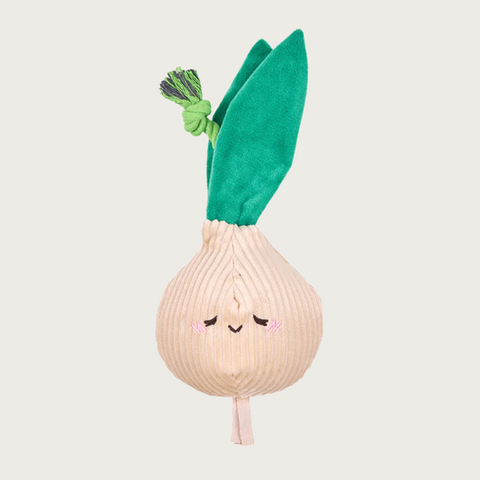 Plush onion dog toy with cute embroidered face. Its body is corduroy, round, and light tan in color, with dark green leaves with a green rope sandwiched between them.
