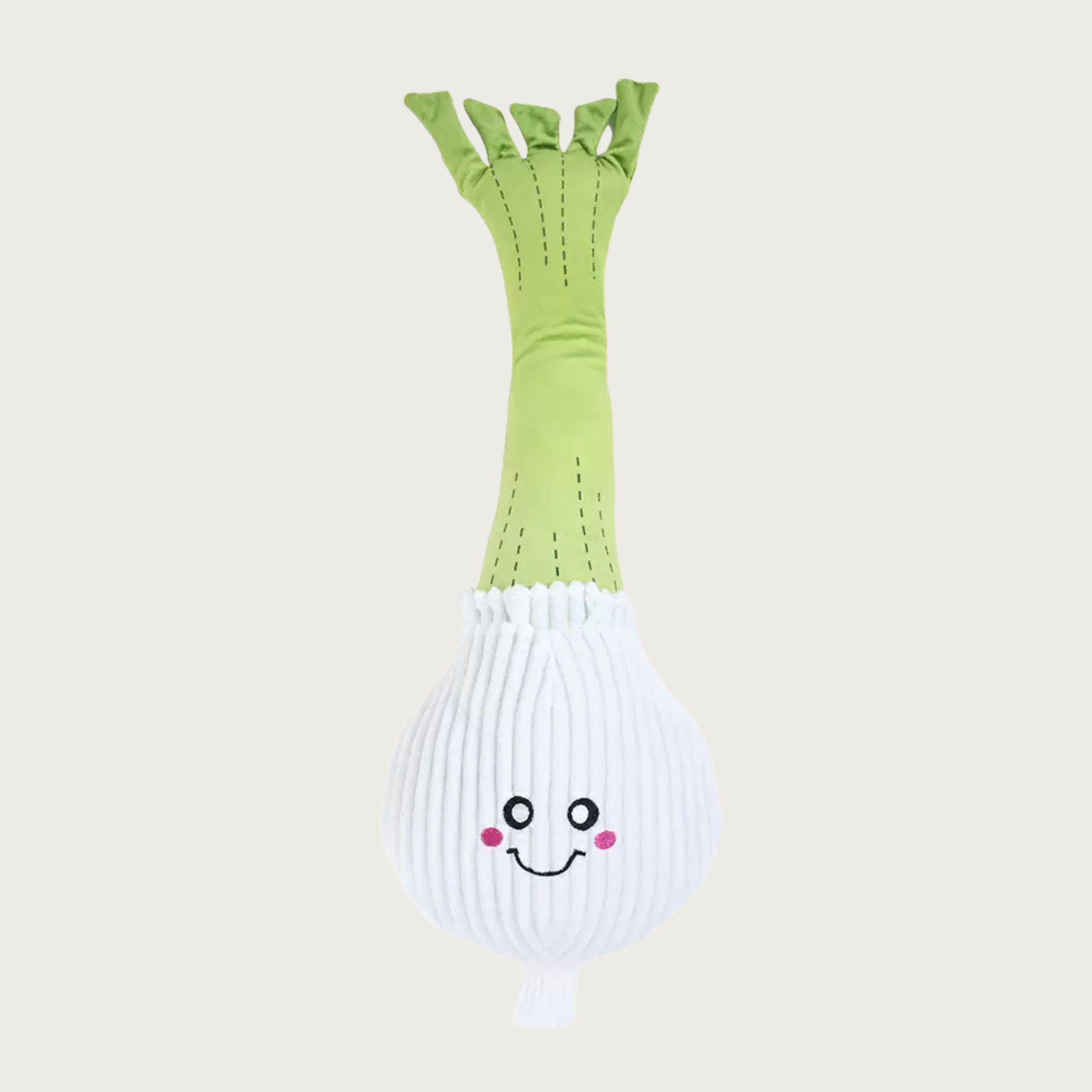 A plush dog toy shaped like an onion with a long light green stem and a white bulbous base, featuring a cute embroidered face.