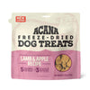 3.25 oz beige & pink bag of Acana Freeze-Dried Dog Treats, Lamb & Apple Recipe. 5 calories per treat, made with 3 simple ingredients. Small transparent window show product inside; small tan-colored, cube shaped treats.