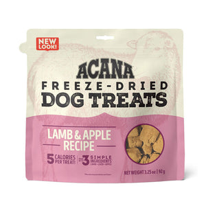 3.25 oz beige & pink bag of Acana Freeze-Dried Dog Treats, Lamb & Apple Recipe. 5 calories per treat, made with 3 simple ingredients. Small transparent window show product inside; small tan-colored, cube shaped treats.