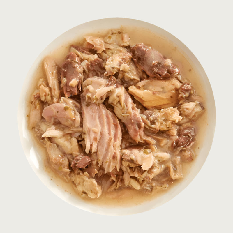 A bowl of Aujou by RAWZ Aku Tuna & Mackerel recipe, showing large and small chunks of fish.