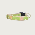 Load image into Gallery viewer, 0.75" width lime green dog collar with sparse, small white polka dot pattern.
