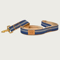Load image into Gallery viewer, Dark denim blue dog leash with tan vertical stripes of different widths.
