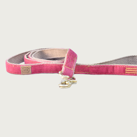 Bubblegum pink corduroy dog leash with brass clasp.