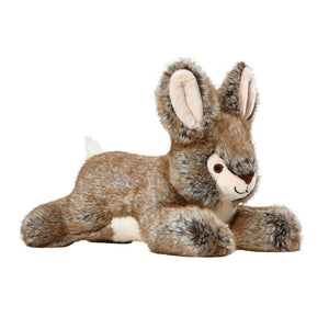 Plush Reese Rabbit dog toy from Fluff & Tuff. Its front and back legs are outstretched, and its body is a warm brownish gray, with cream tummy, tail, muzzle and inner ears.