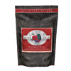 A 4 pound black and red bag of Fromm Beef Frittata Veg Recipe dog food. The banner on top of the bag reads "Grain-Free Entree".