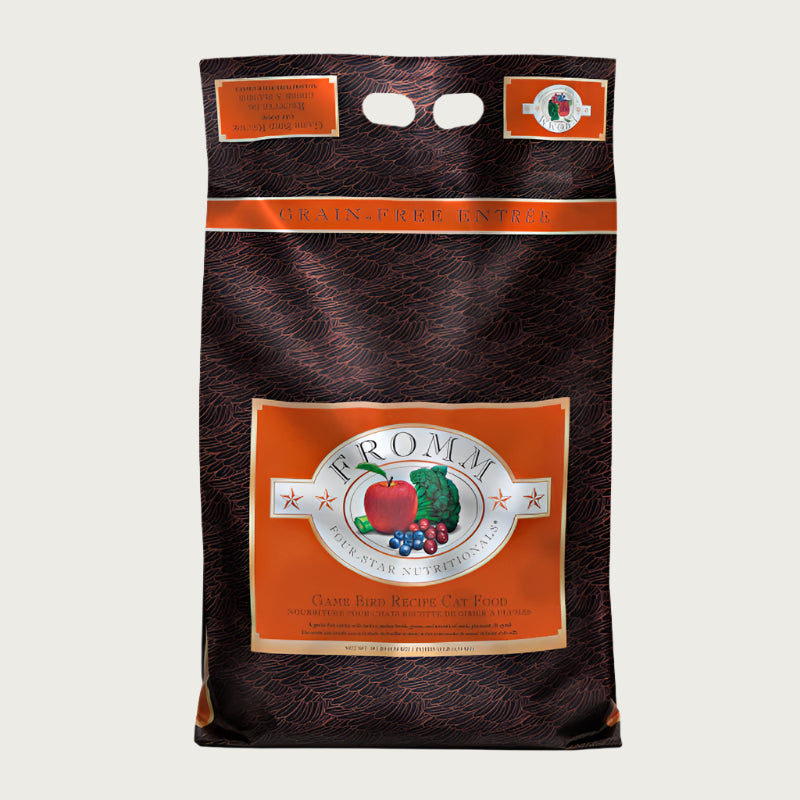 A 10 pound black and rust brown bag of Fromm Game Bird Recipe food for cats. The banner on top of the bag reads "Grain-Free Entree".