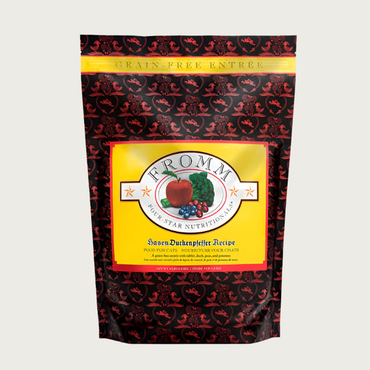 A 4 pound black, yellow, and red bag of Fromm Hasen Duckenpfeffer Recipe cat food. The banner on top of the bag reads "Grain-Free Entree".