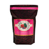 A 4 pound black and fuchsia bag of Fromm Pork & Peas Recipe dog food. The banner on top of the bag reads "Grain-Free Entree".
