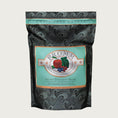 Load image into Gallery viewer, A 4 pound black and seafoam green bag of Fromm Salmon Tunachovy Recipe cat food. The banner on top of the bag reads "Grain-Free Entree".

