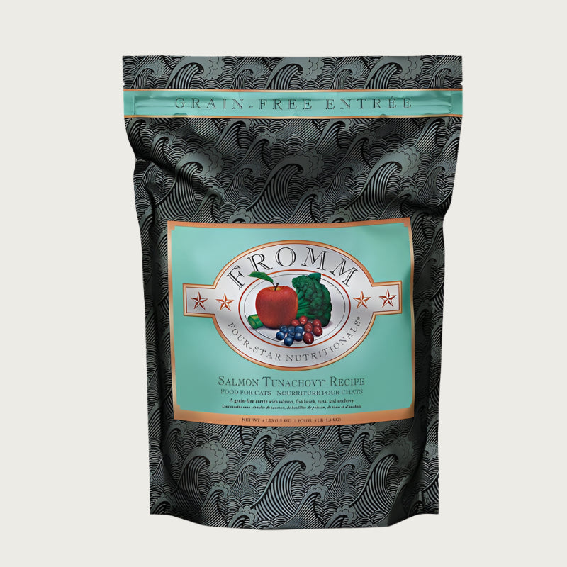 A 4 pound black and seafoam green bag of Fromm Salmon Tunachovy Recipe cat food. The banner on top of the bag reads "Grain-Free Entree".