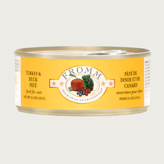 A 5.5 oz can of Fromm cat food turkey & duck pâté.