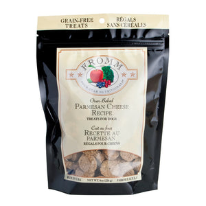 An 8 oz cream and black bag of Fromm Four-Star Nutritionals, Oven-Baked Parmesan Cheese Recipe dog treats. Banner on top of bag reads "grain-free treats".