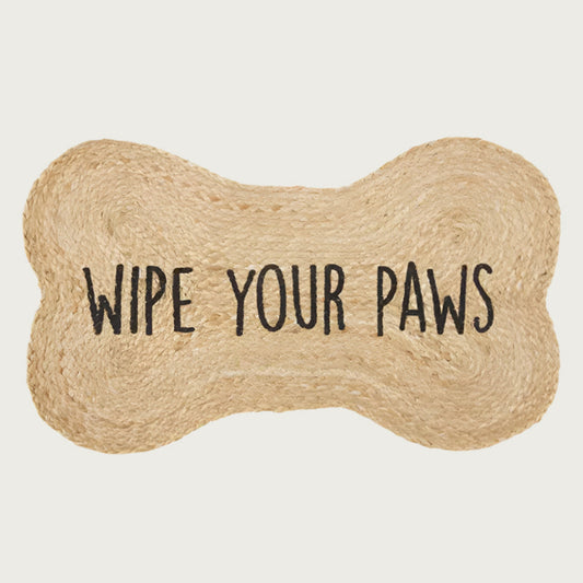Natural jute, dog bone-shaped doormat with 'Wipe Your Paws' in black text.