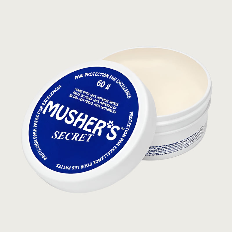 Small white plastic tub of Musher's Secret paw protection cream with blue label. 60 g.