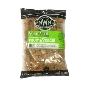 A 2 pound bag of Northwest Naturals frozen fruit and vegetable nugget treats for dogs. Bag is clear, and small cube-sized nuggets are visible.