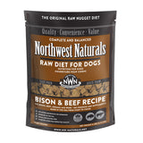 A 6 pound bag of Northwest Naturals frozen raw diet for dogs, bison and beef recipe. Clear window on bag shows small cube-sized nuggets.