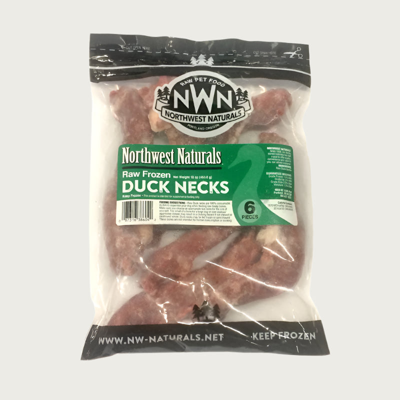 A bag of Northwest Naturals frozen raw duck necks for dogs, containing 6 necks. Bag is clear, and the raw duck necks are visible.