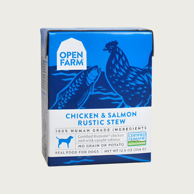 A 12.5 oz blue and white carton of Open Farm Chicken & Salmon Rustic Stew dog food. 100% Human Grade Ingredients. With Certified Humane chicken and wild-caught salmon, no grain or potato.