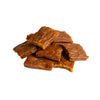 A close-up photo of a small handful of the Open Farm Turkey dog treat. They are rectangular brown pieces that look like jerky, about 1"-2" long and 1/8" thick.