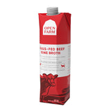 A 32 oz red & white carton with spout, of Open Farm Grass-Fed Beef Bone Broth Meal Topper for Dogs & Cats. 