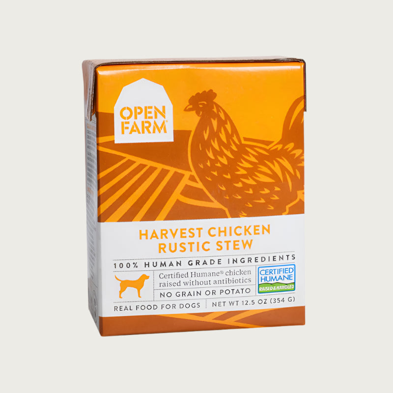 A 12.5 oz yellow and white carton of Open Farm Harvest Chicken Rustic Stew dog food. 100% Human Grade Ingredients. With Certified Humane chicken, no grain or potato.