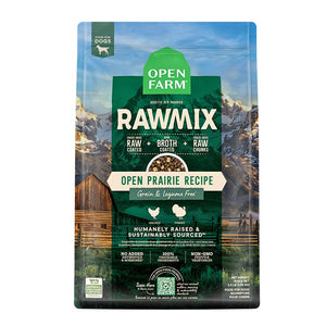A bag of Open Farm RawMix Grain Free Open Prairie Recipe dog food. Humanely raised and sustainably sourced. A mountain ranch scene is in the background of the bag, with a vertical green bar behind the white text to highlight it.