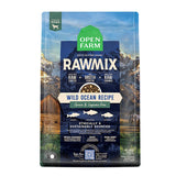 A bag of Open Farm RawMix Grain Free Wild Ocean Recipe dog food. Humanely raised and sustainably sourced. A mountain ranch scene is in the background of the bag, with a vertical blue bar behind the white text to highlight it.