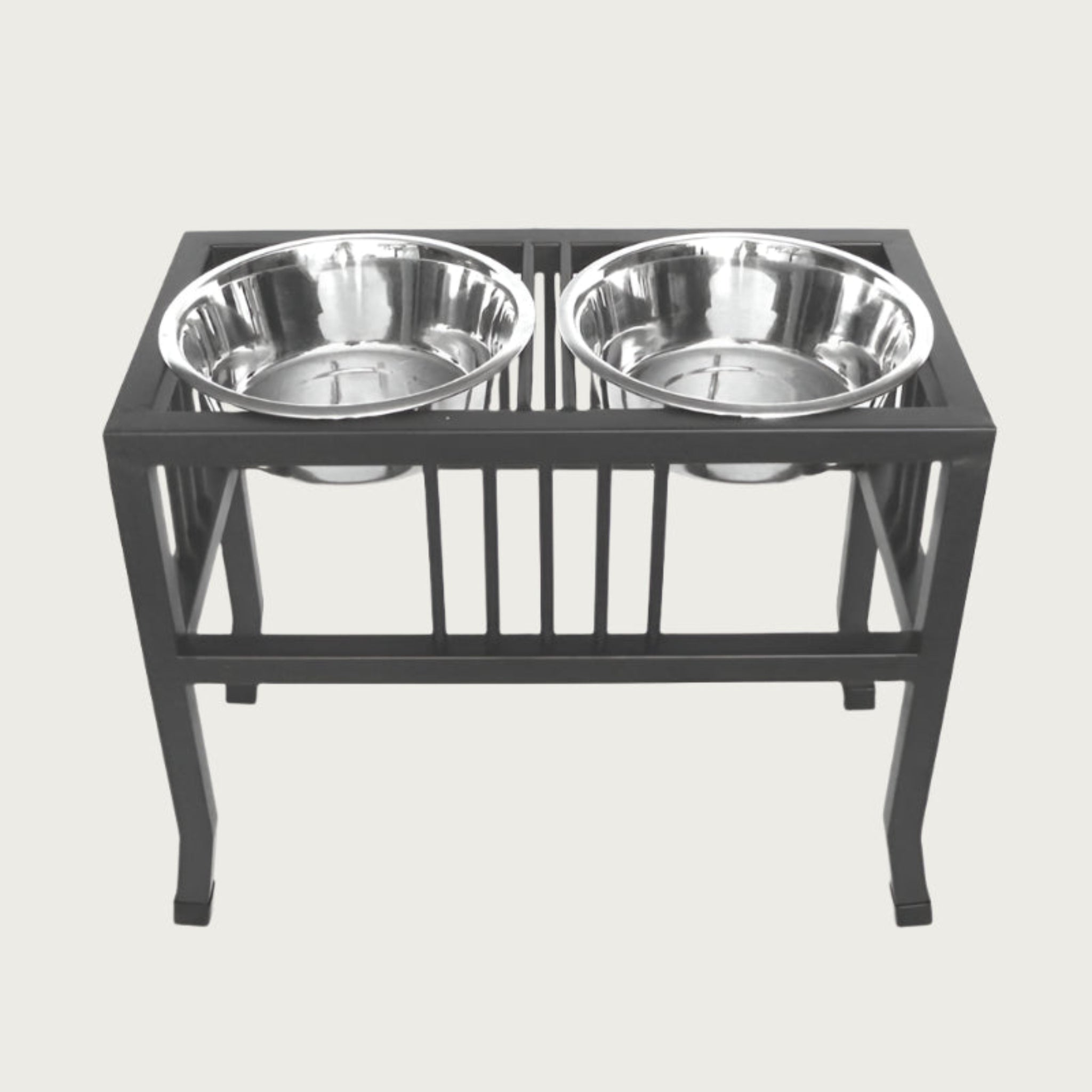 X-large elevated pet feeder with two metal bowls on a black stand.