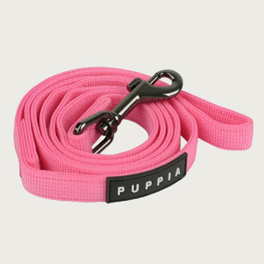 Bubblebum pink dog leash with dark metal clip and black & white Puppia tag.