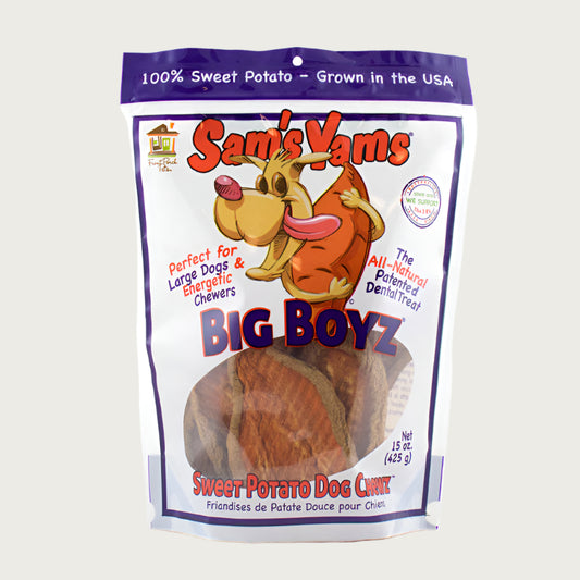 15 oz white & purple bag of Front Porch Pets Sam's Yams Big Boyz Sweet Potato Dog Chews. Perfect for large dogs & energetic chewers. The all-natural patented dental treat. 100% sweet potato - grown in the USA. Large clear window in bag shows contents - thick slices of sweet potato, sliced lengthwise, with crinkle cut texture and skin on.
