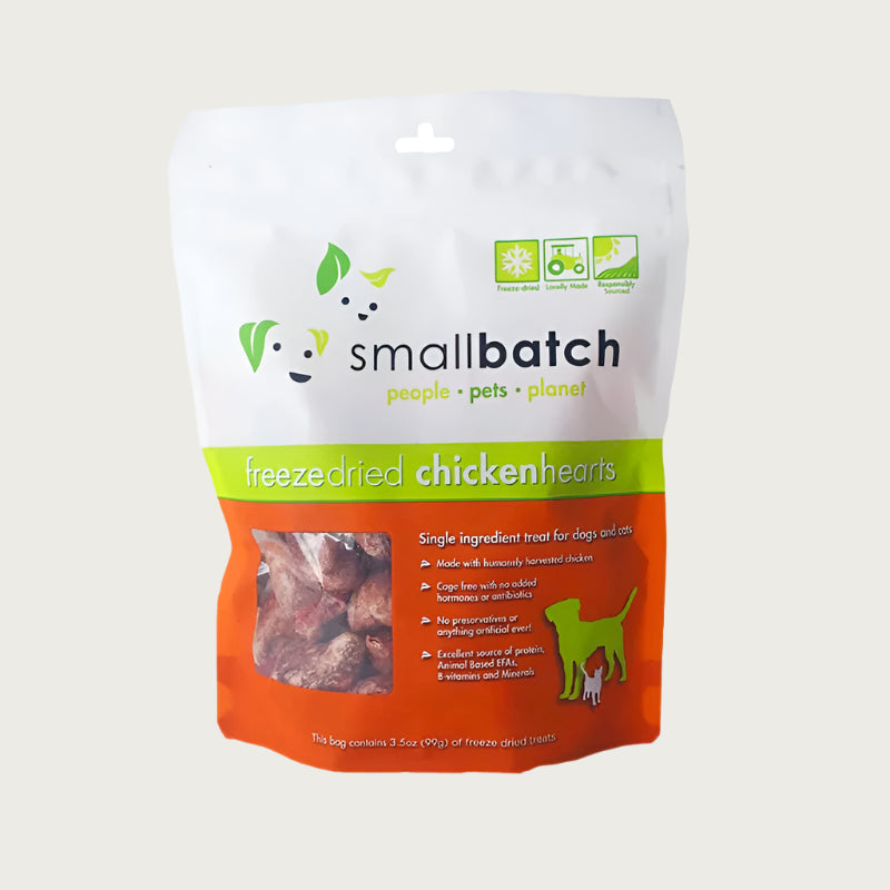 An orange and white bag of Smallbatch freeze-dried raw chicken heart treats for dogs and cats, 3.5 ounces. This is a single ingredient treat. The bag has a small, clear window showing the whole organ treats, which are about 2-3 inches long.