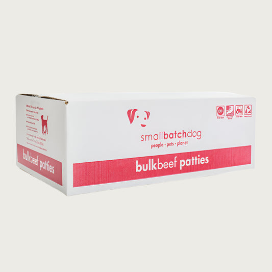 A red and white box of Smallbatch beef batch recipe, frozen raw dog food. This 18 pound bulk box contains 36 patties.
