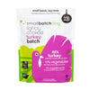 A hot pink and white, 5 pound bag of frozen Smallbatch turkey batch recipe sliders, lightly cooked dog food.