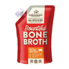16 oz pouch with spout, of Stella & Chewy's Bountiful Bone Broth Grass-Fed Beef Bone Broth Recipe, meal topper for dogs. Human-grade, perfect for picky eaters.