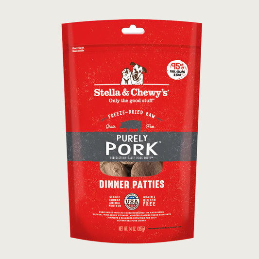 14 oz red bag of Stella & Chewy's "Only the good stuff" Purely Pork Dinner Patties. Additional text: 95% pork, organs & bone, freeze-dried raw, grain free.
