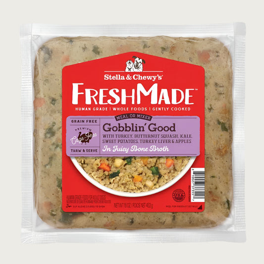 A 16 oz clear pouch of Stella & Chewy's FreshMade Gently Cooked Gobblin' Good dog food. Product is visible around the centered red label, and looks like finely ground turkey with chopped vegetables.