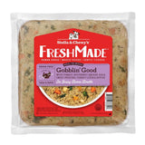 A 16 oz clear pouch of Stella & Chewy's FreshMade Gently Cooked Gobblin' Good dog food. Product is visible around the centered red label, and looks like finely ground turkey with chopped vegetables.