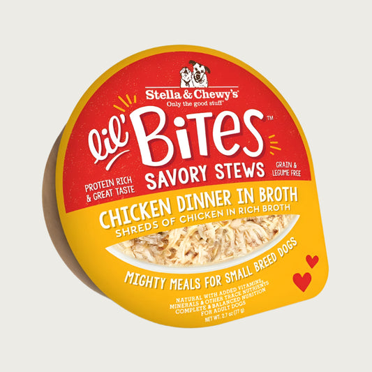 A 2.7 oz cup of Stella & Chewy's Lil' Bites Savory Stews Chicken Dinner in Broth, Mighty Meals for Small Breed Dogs. Shreds of chicken in rich broth. Packaging is a clear plastic cup with peel off lid. 