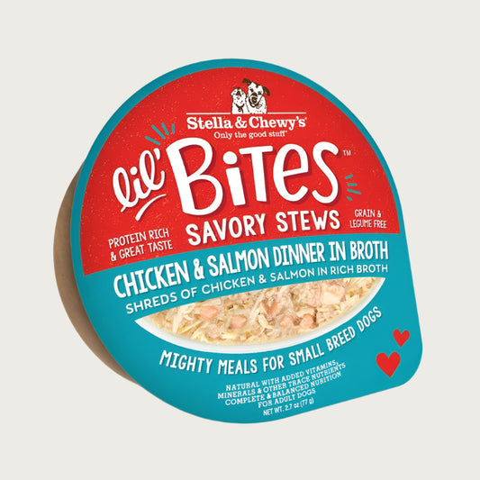 A 2.7 oz cup of Stella & Chewy's Lil' Bites Savory Stews Chicken & Salmon Dinner in Broth, Mighty Meals for Small Breed Dogs. Shreds of chicken & salmon in rich broth. Packaging is a clear plastic cup with peel off lid. 