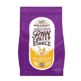 2.5 lb purple bag of Stella & Chewy's Freeze-Dried Raw Coated Kibble, Cage-Free Chicken Recipe for cats. Grain free, protein focused nutrition. A small illustration of a chicken is in the center of the bag.