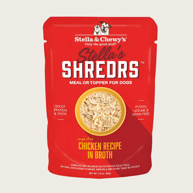 A 2.8 oz red pouch of Stella & Chewy's Stella's Shredrs Meal or Topper for Dogs, Chicken Recipe in Broth. Small image in center shows a bowl of shredded food.