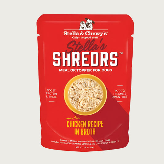 A 2.8 oz red pouch of Stella & Chewy's Stella's Shredrs Meal or Topper for Dogs, Chicken Recipe in Broth. Small image in center shows a bowl of shredded food.