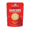 A 2.8 oz red pouch of Stella & Chewy's Stella's Shredrs Meal or Topper for Dogs, Chicken Recipe in Broth. Small image in center shows a bowl of shredded food.